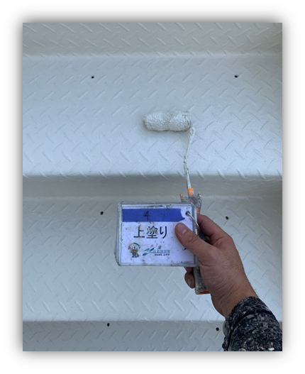 奈良の香芝市の株式会社ヨネヤの外壁塗装と屋根塗装の階段上塗り